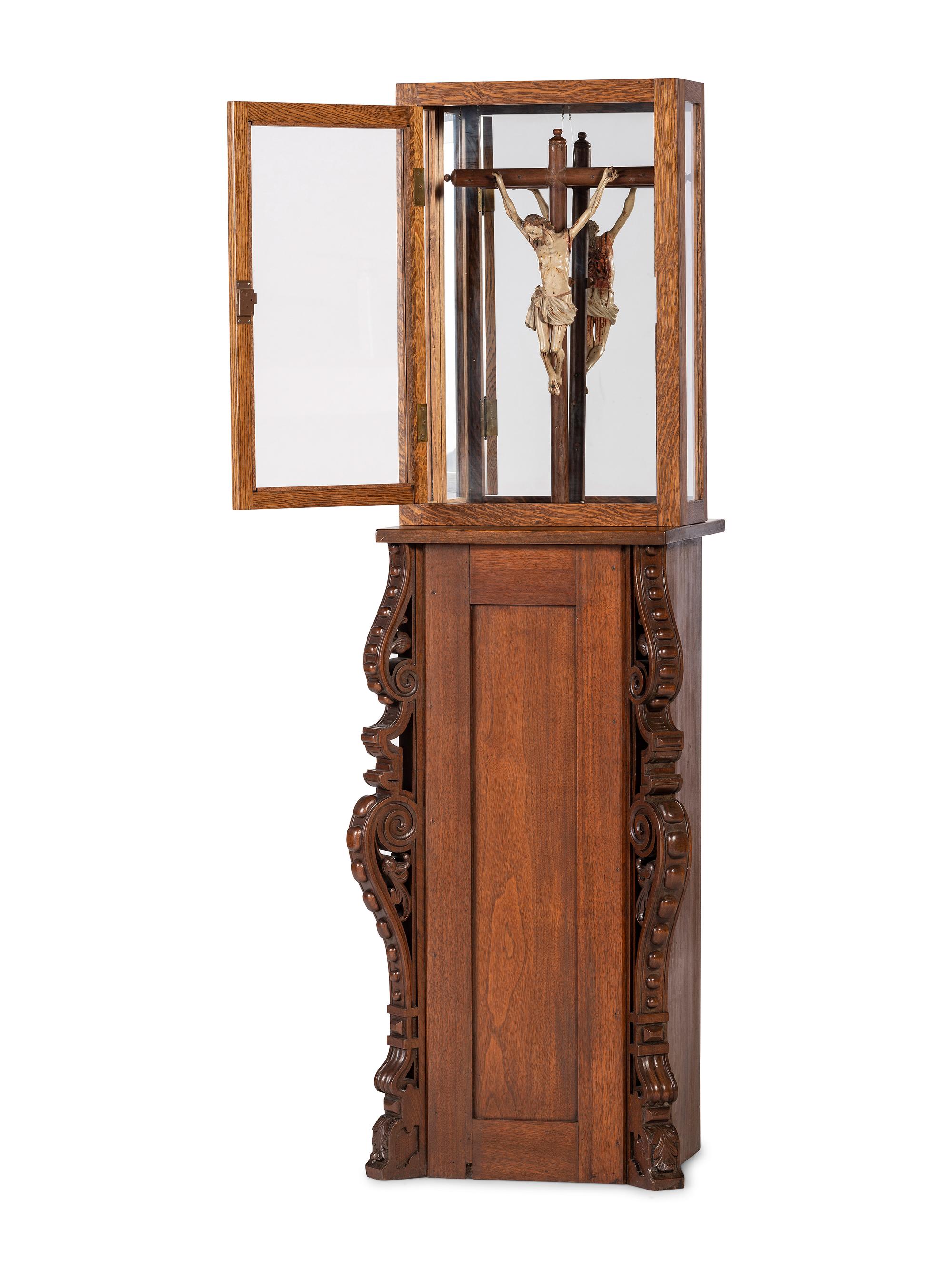 A Spanish Colonial Carved and Painted Wood Crucifix