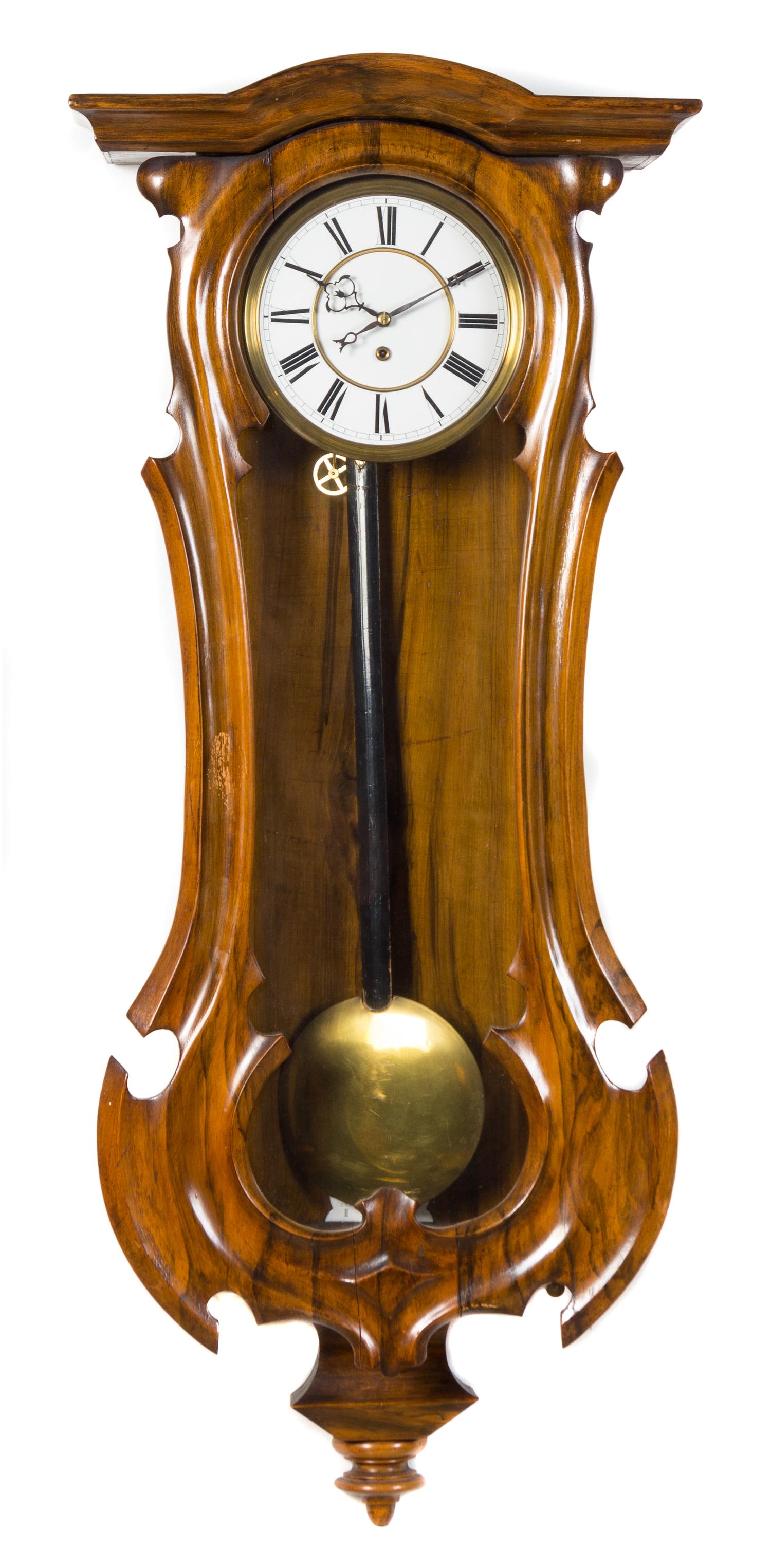 An American Simulated Rosewood Wall Clock Length of case 38 1/2 inches.