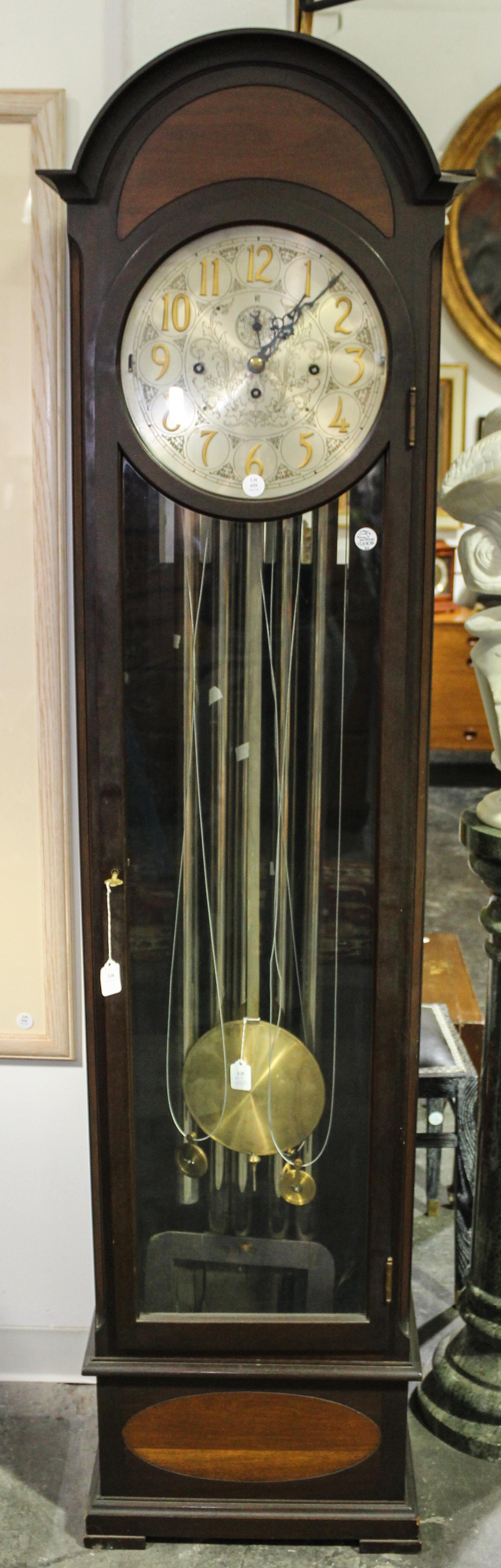 An American Tall Case Clock Height 76 inches. — 20TH CENTURY