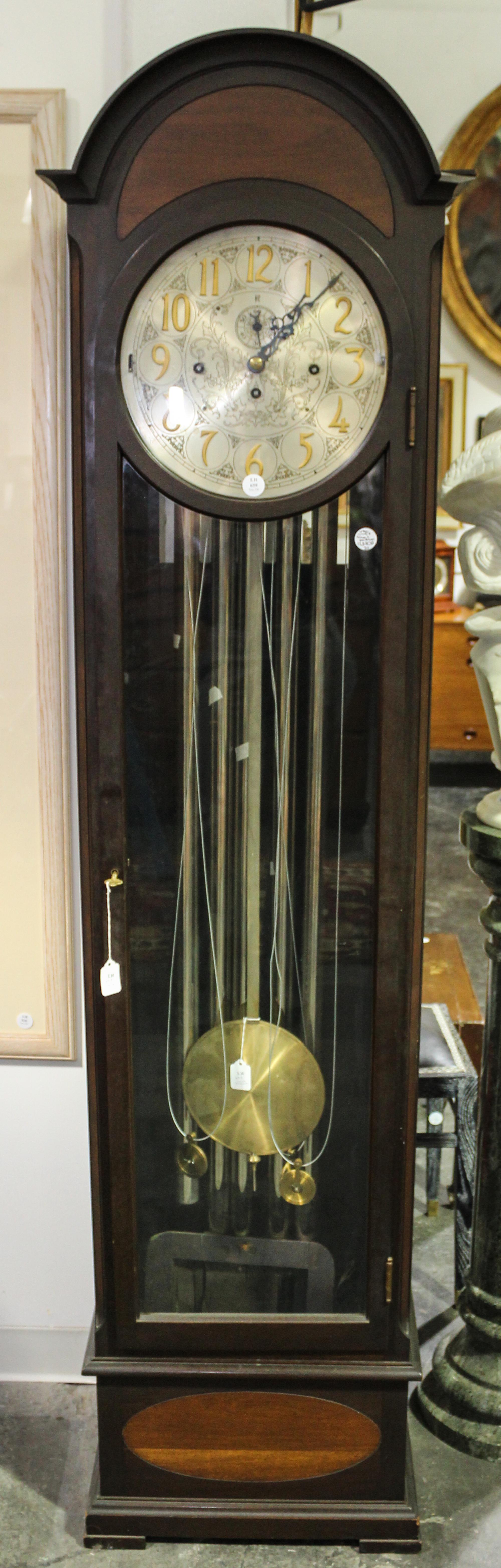 An American Tall Case Clock Height 76 inches. — 20TH CENTURY