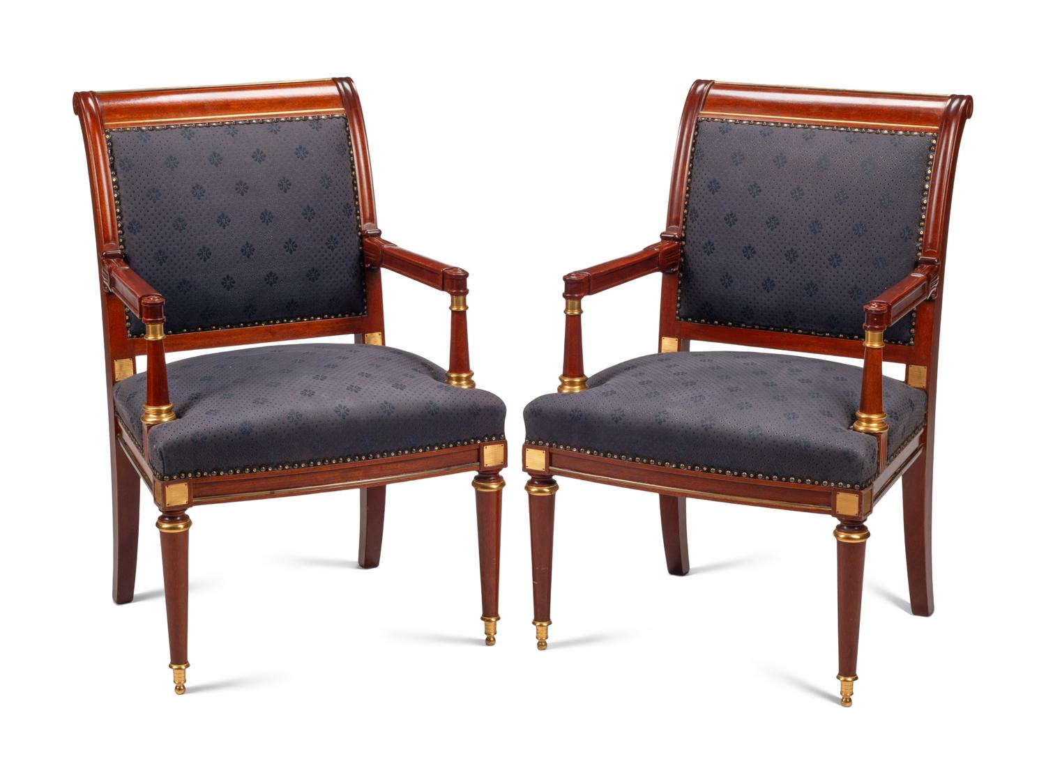 A Pair of Directoire Style Gilt Bronze Mounted Mahogany Armchairs