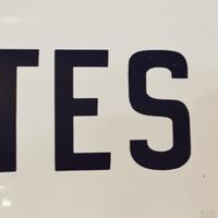An Enameled Steel "TOILETTES" Sign 35.5" W .25" D X 13.5" H — Argentina, Circa 1920