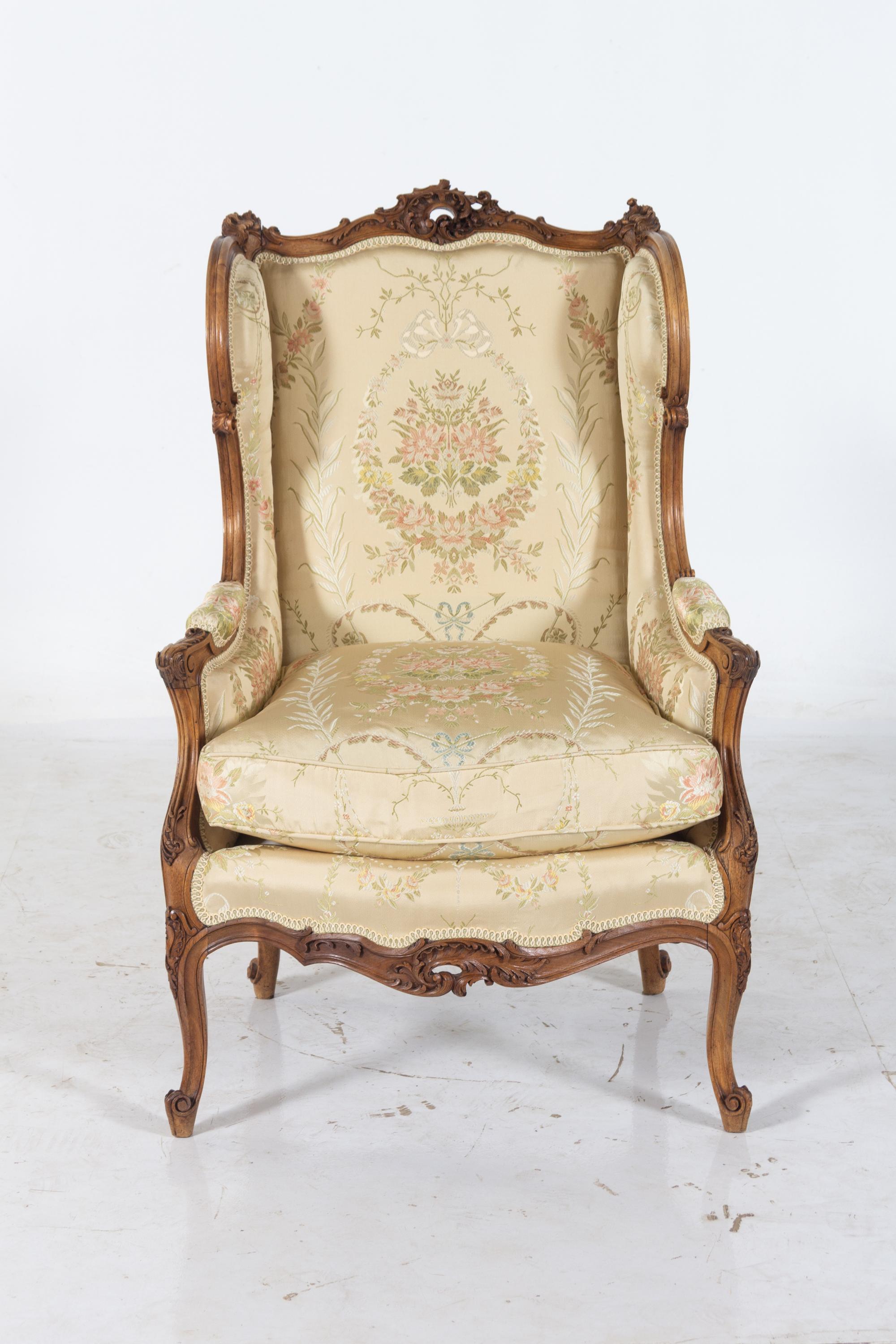 A Louis XV Style Carved Walnut Bergere