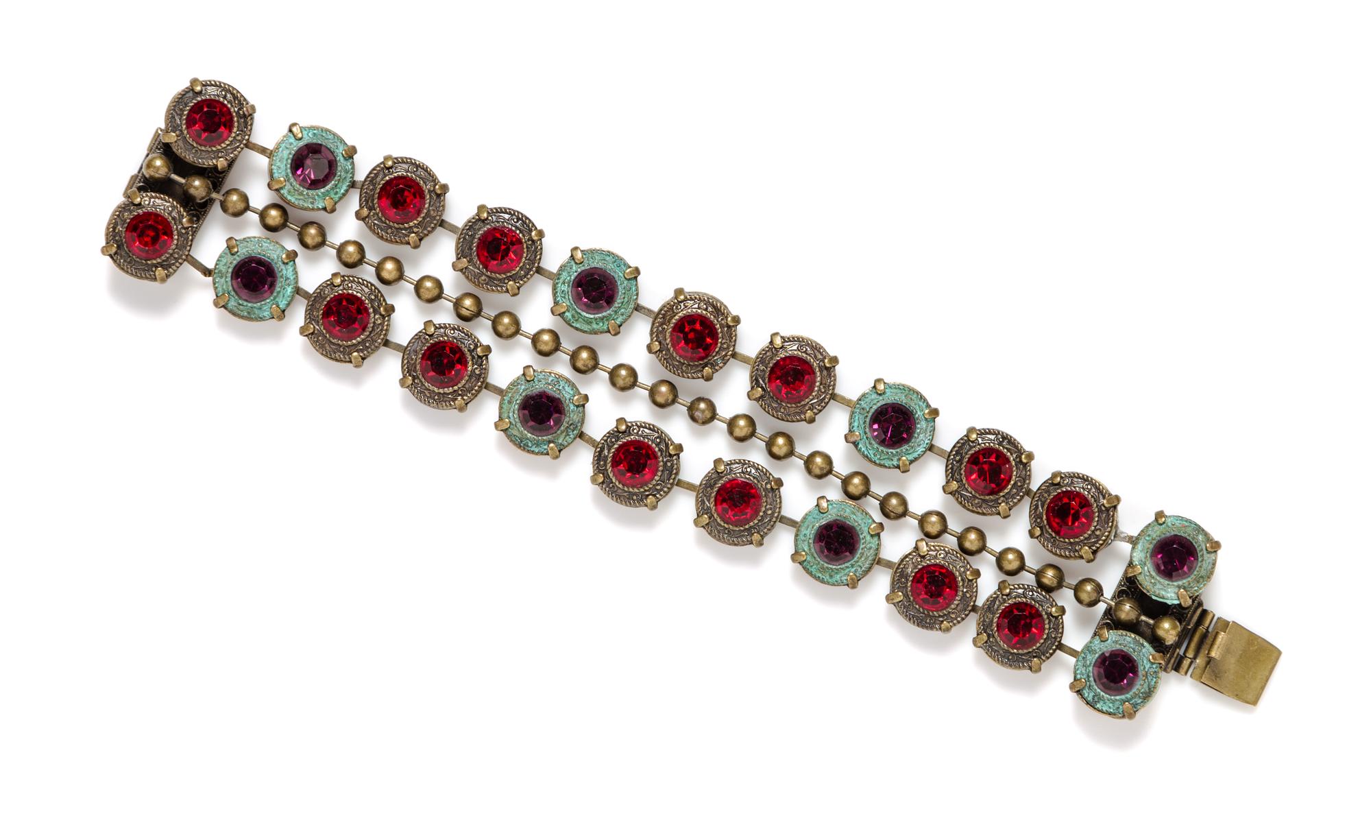 A Jean-Louis Blin Metal Three Strand Bracelet, 7" x 1".