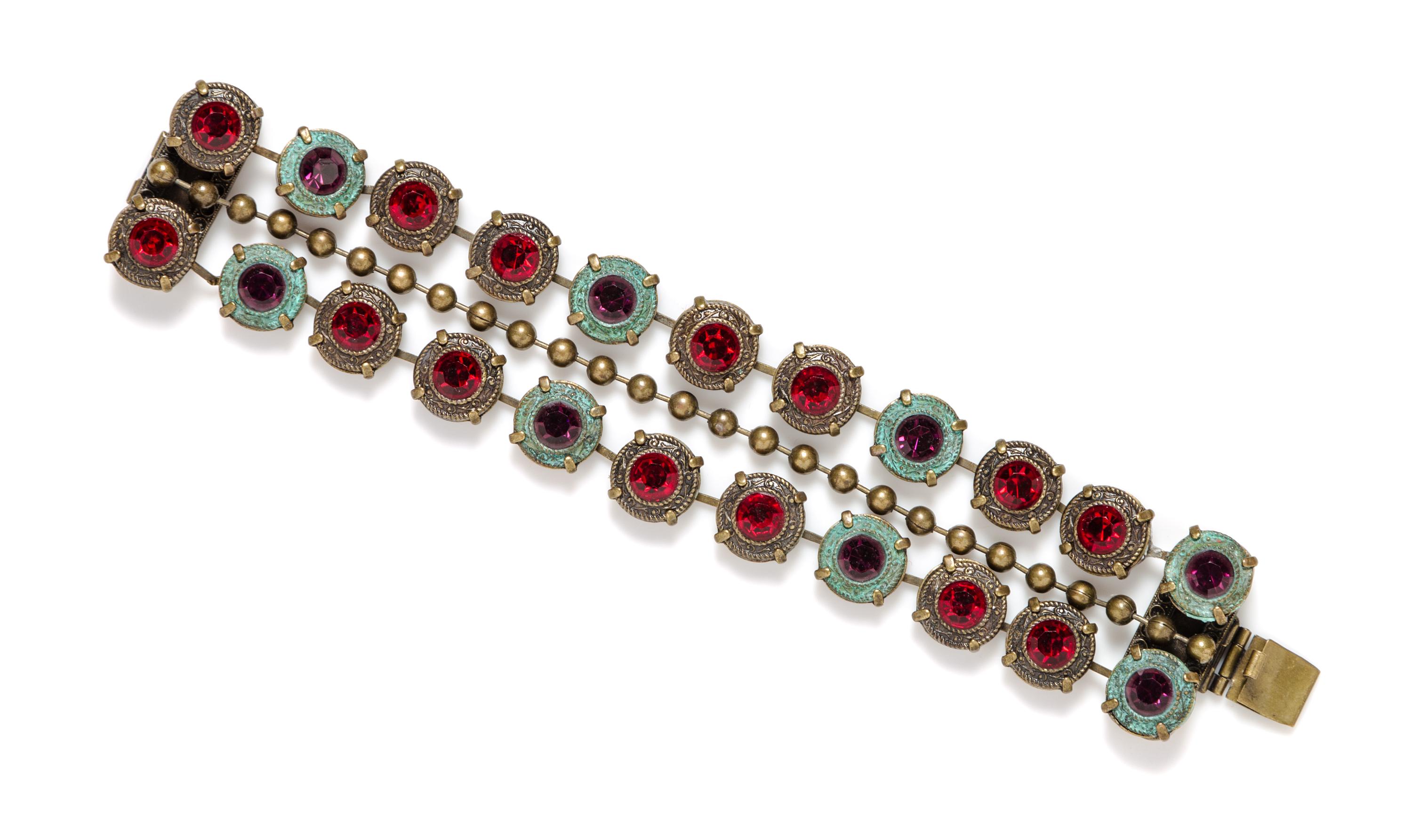 A Jean-Louis Blin Metal Three Strand Bracelet, 7" x 1".