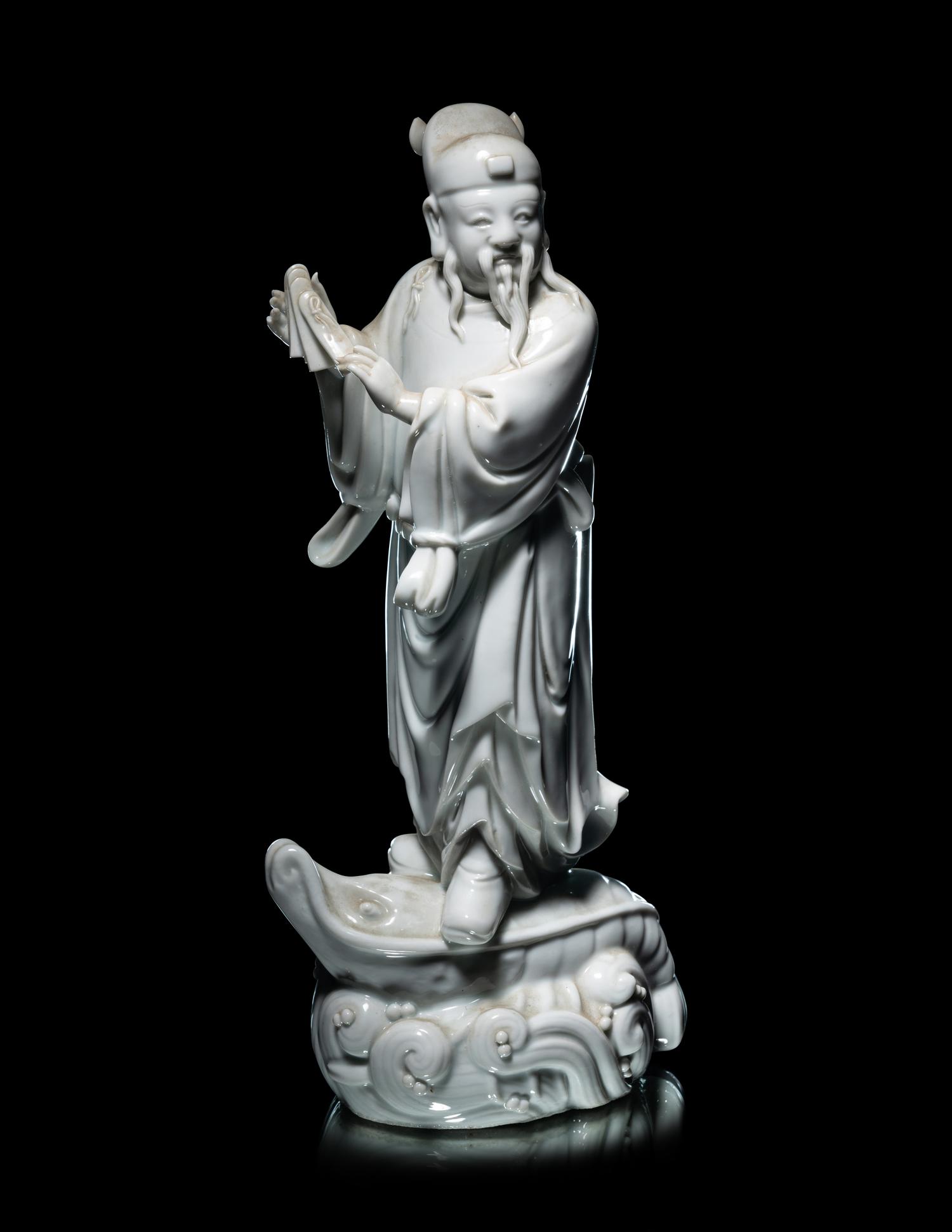 A Chinese Blanc-de-Chine Porcelain Figure of an Official