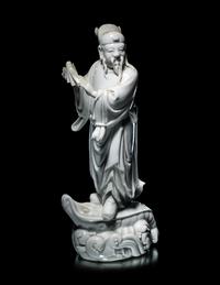 A Chinese Blanc-de-Chine Porcelain Figure of an Official