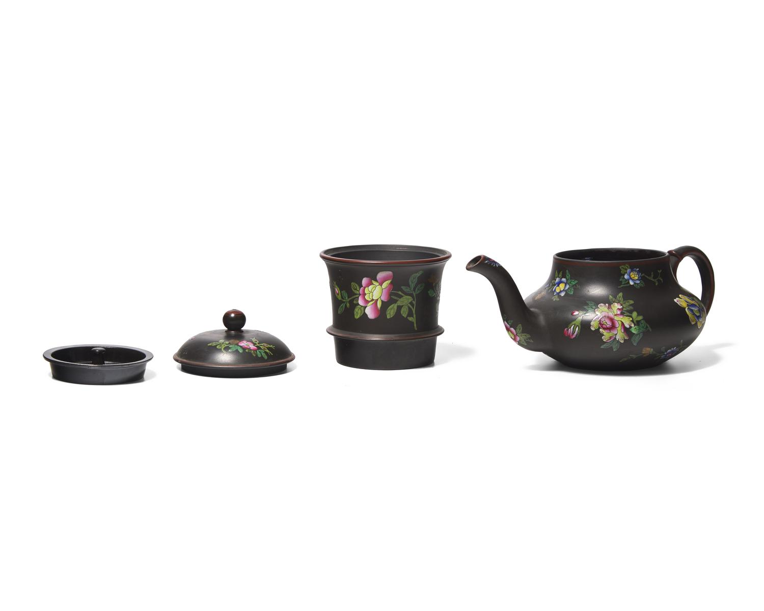 A Wedgwood Capriware Black Basalt Teapot with Strainer and Creamer
