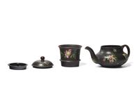A Wedgwood Capriware Black Basalt Teapot with Strainer and Creamer