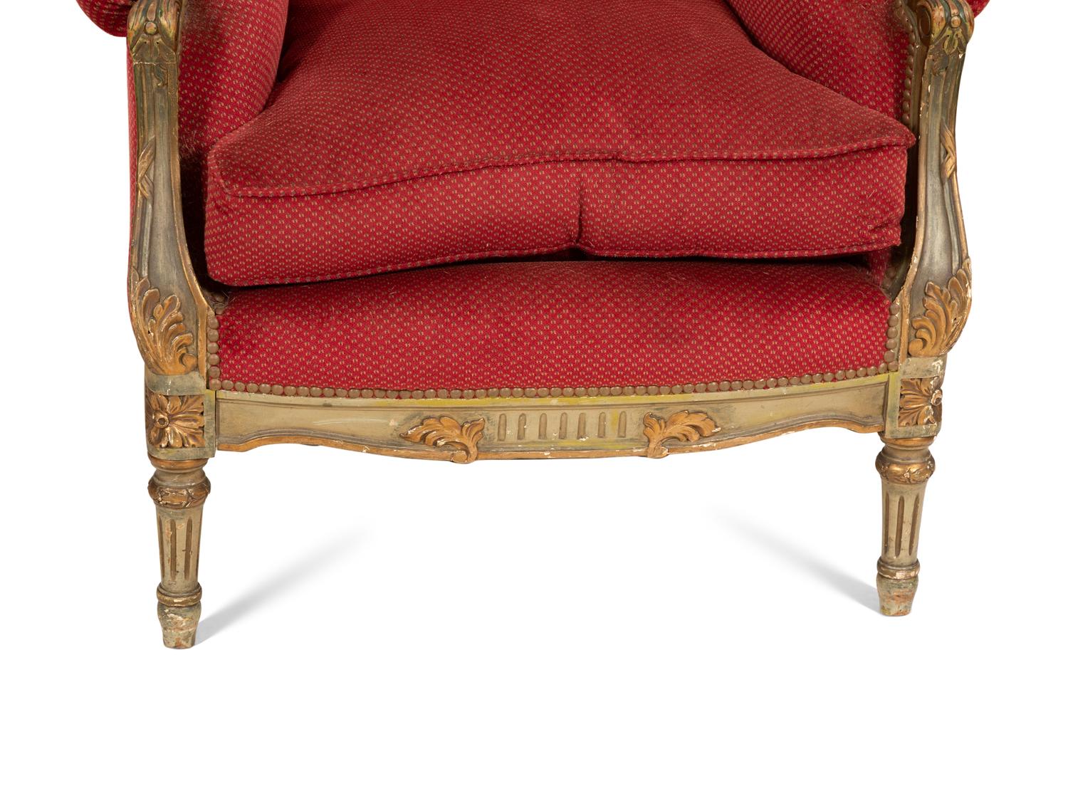 A Pair of Louis XVI Style Painted and Parcel Gilt Bergères à Oreille Attributed to Maison Jansen