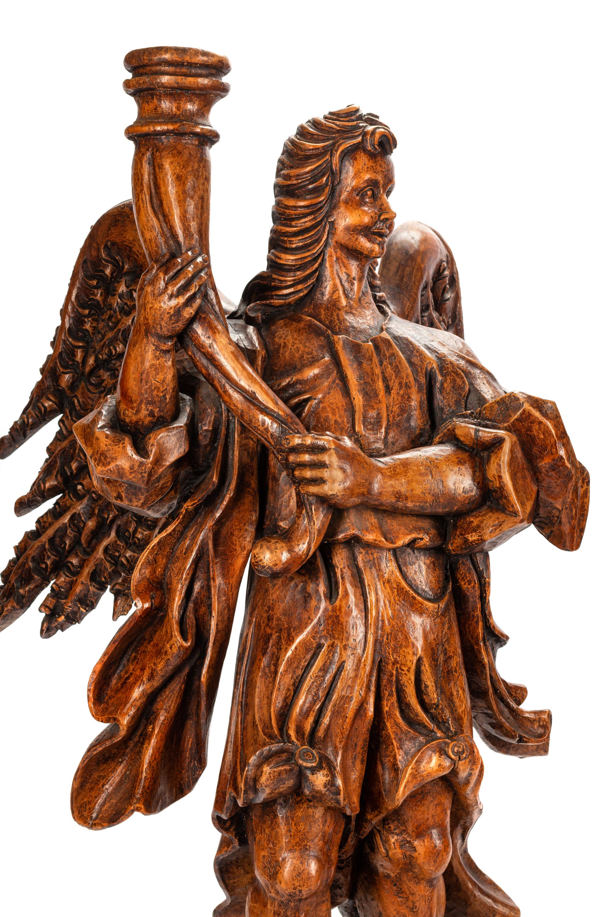 A Pair of Italian Carved Wood Figural Torchères