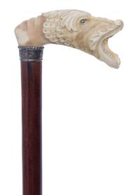 An English Ivory Handled Cane, Length of handle 3 7/8 x length overall 33 3/4 inches.