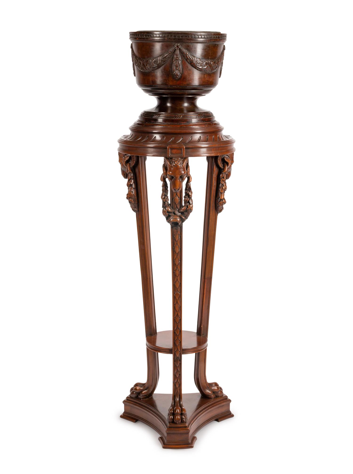 A George III Style Carved Mahogany Jardinière on Pedestal