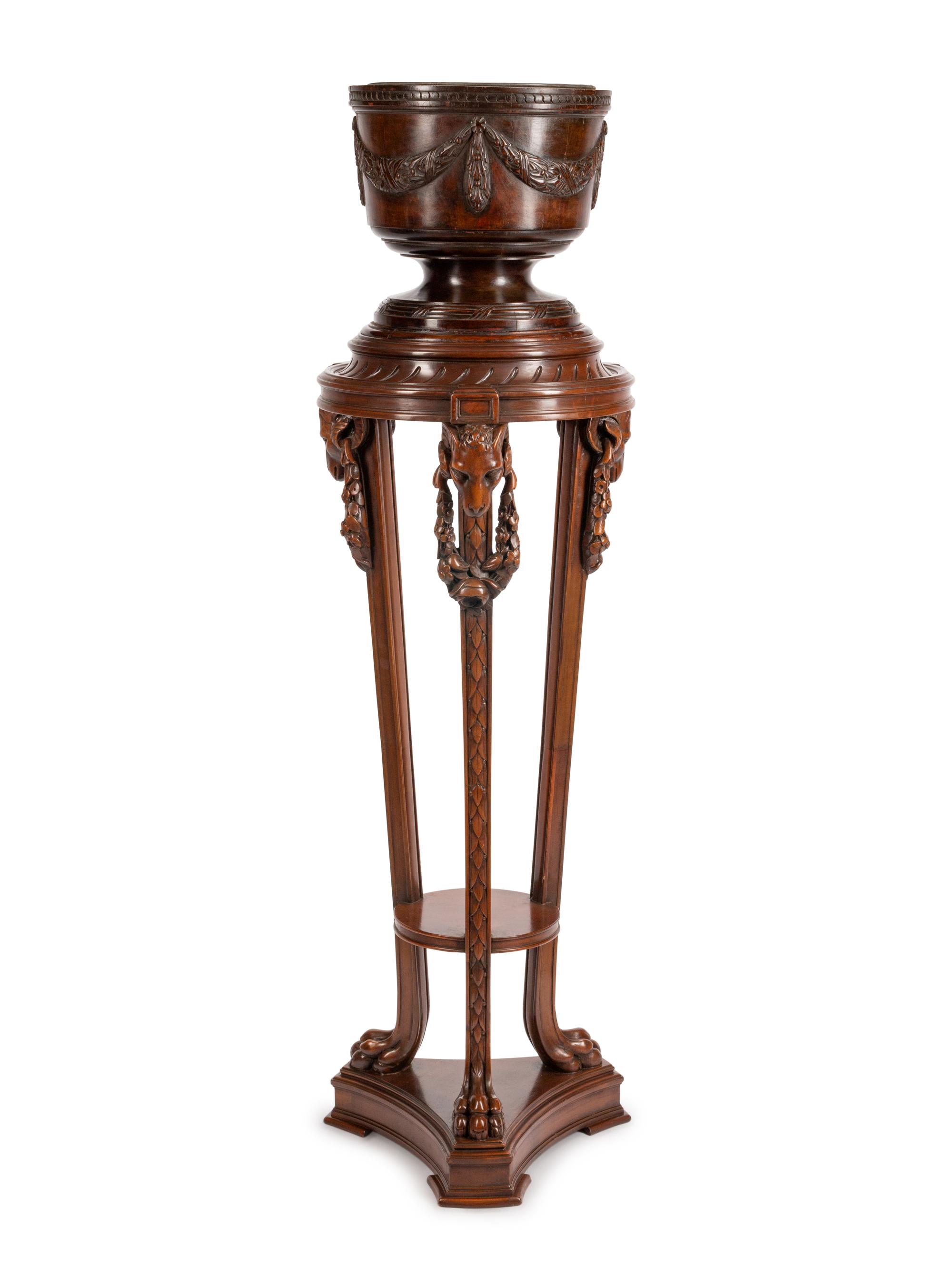A George III Style Carved Mahogany Jardinière on Pedestal