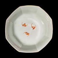 A Chinese Coral-Ground Famille Rose Octagonal Bowl, 20th Century — 近代 珊瑚紅地描金粉彩仙人乘槎圖八方碗