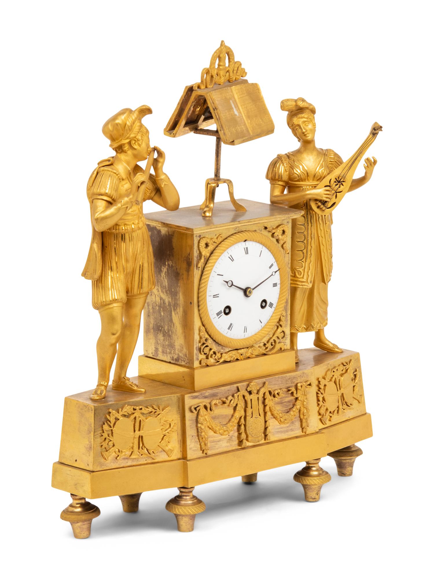 An Empire Gilt Bronze Figural Mantel Clock