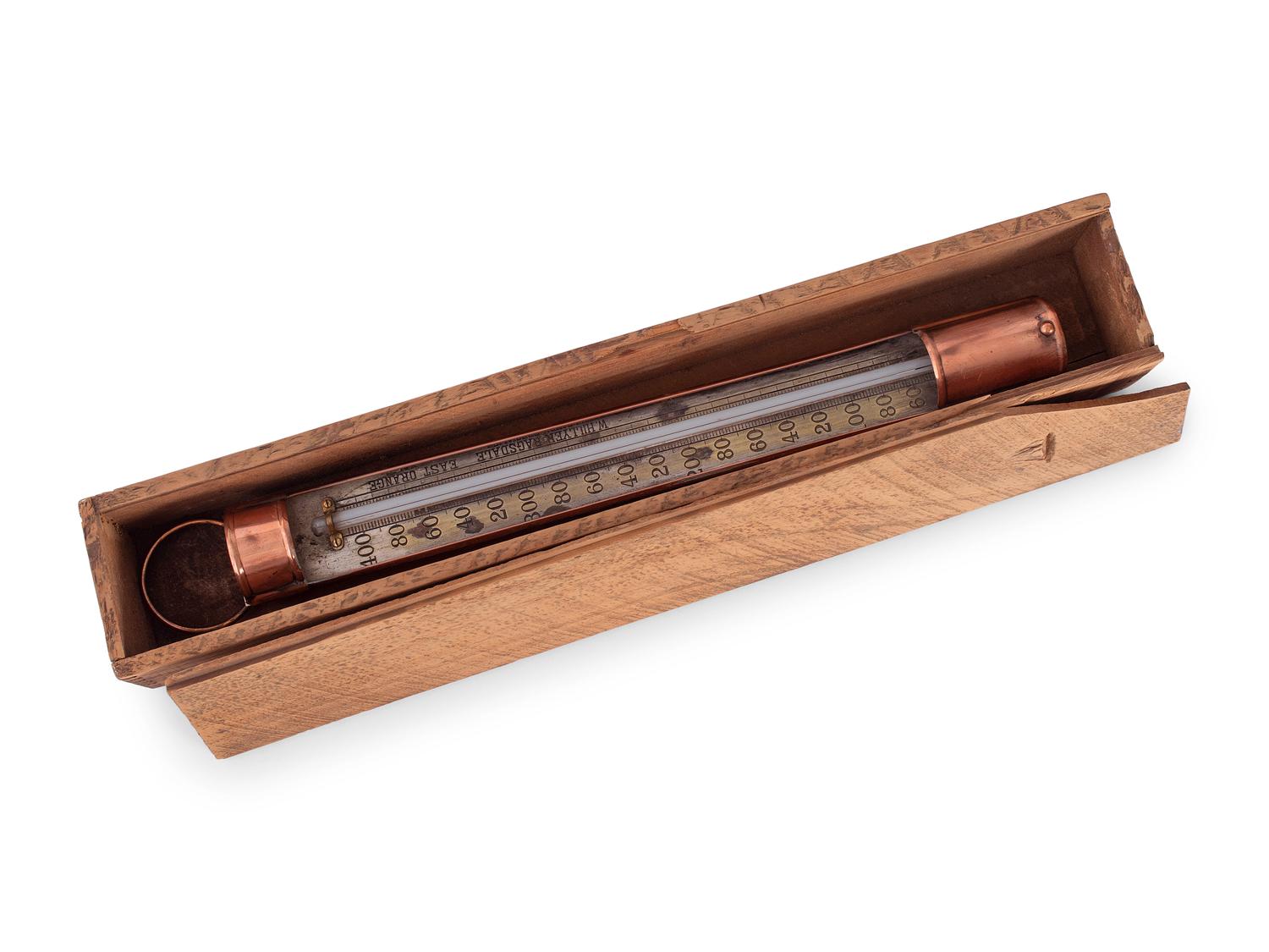 A Copper Tycos Candy Thermometer and a Wood Encased Floating Bath or Dairy Thermometer