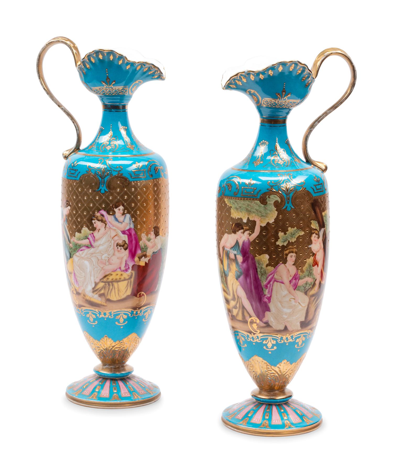 A Pair of Vienna Style Porcelain Ewers