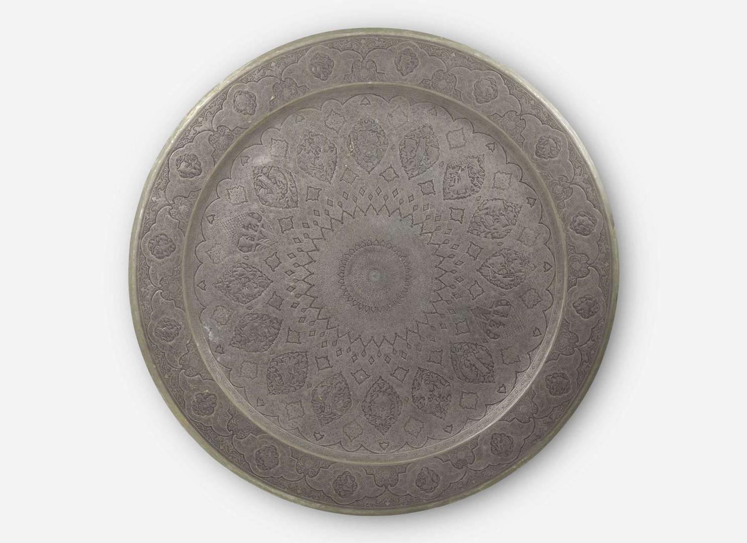 A large Persian hand-dotted silvered metal tray, probably Isfahan, circa 1900