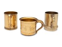 Three American Silver-Gilt Mugs