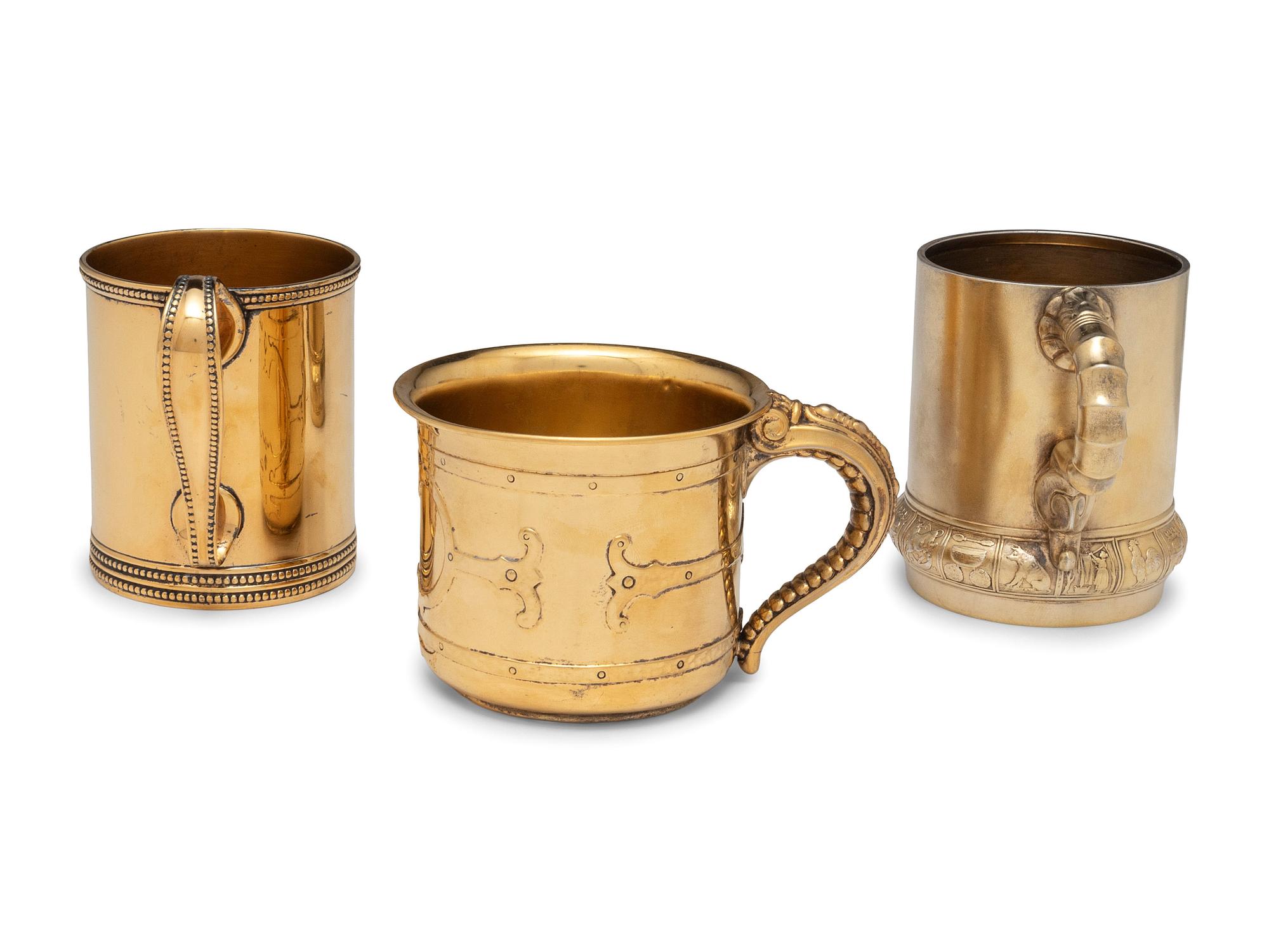 Three American Silver-Gilt Mugs