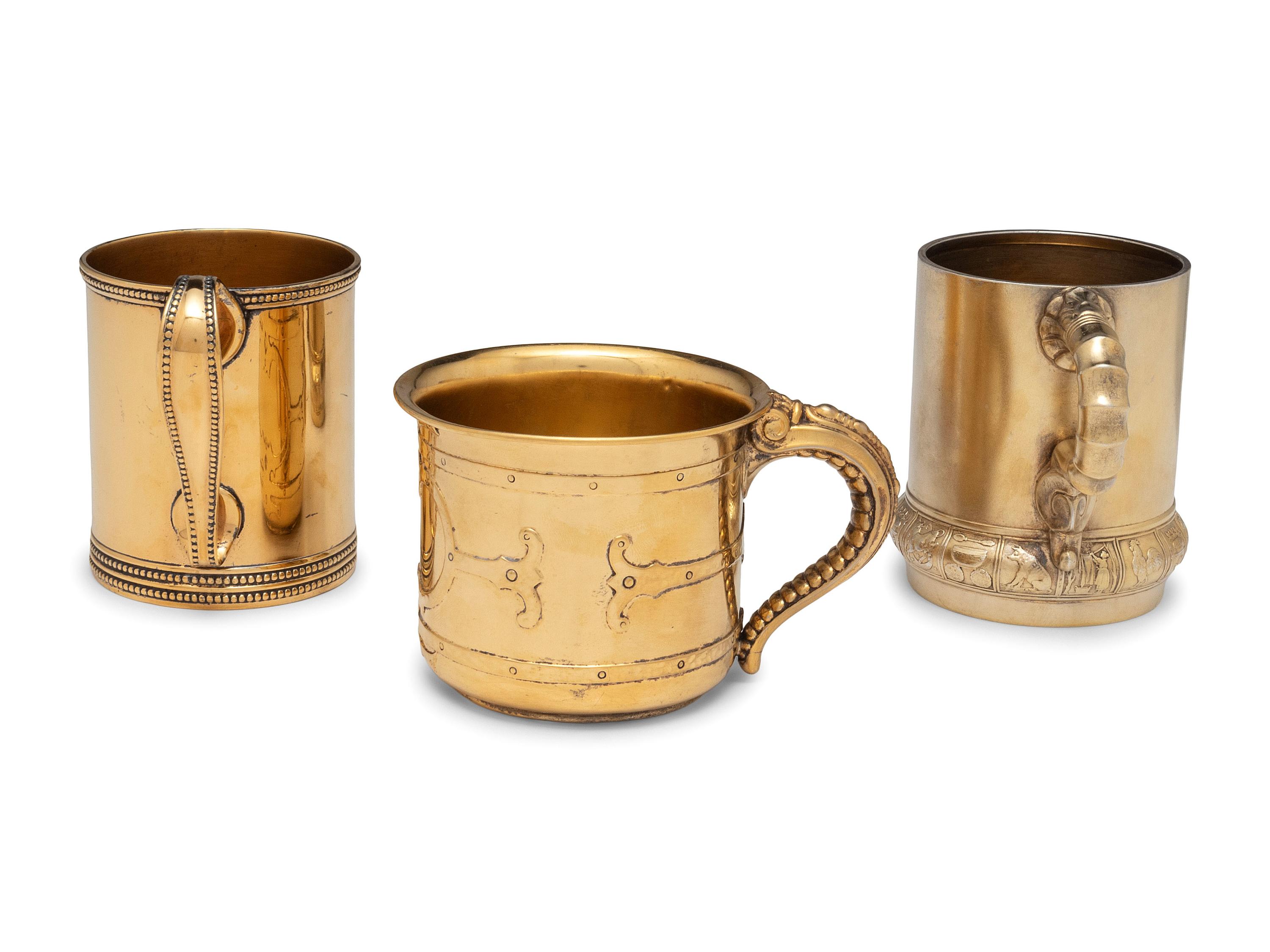 Three American Silver-Gilt Mugs
