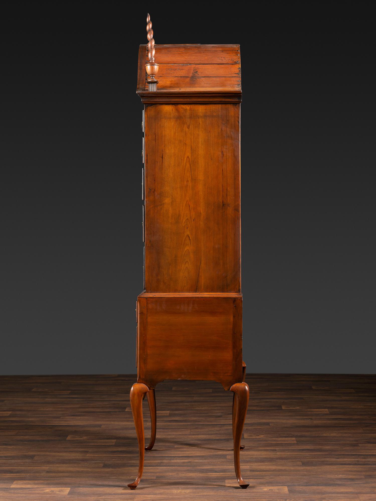 A Queen Anne Fan-Carved Cherrywood Bonnet Top High Chest