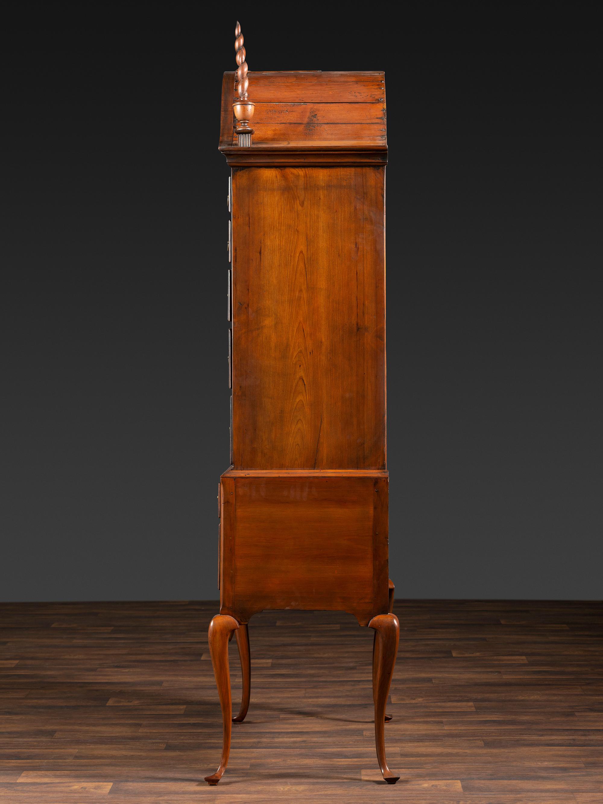 A Queen Anne Fan-Carved Cherrywood Bonnet Top High Chest