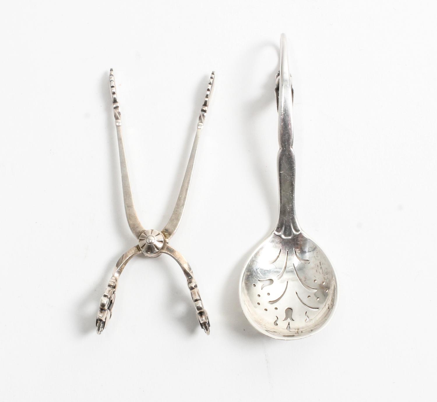 Two Danish Silver Serving Articles, Georg Jensen Silversmithy, Copenhagen, comprising Acorn pattern sugar nips dated circa 1920 and a B