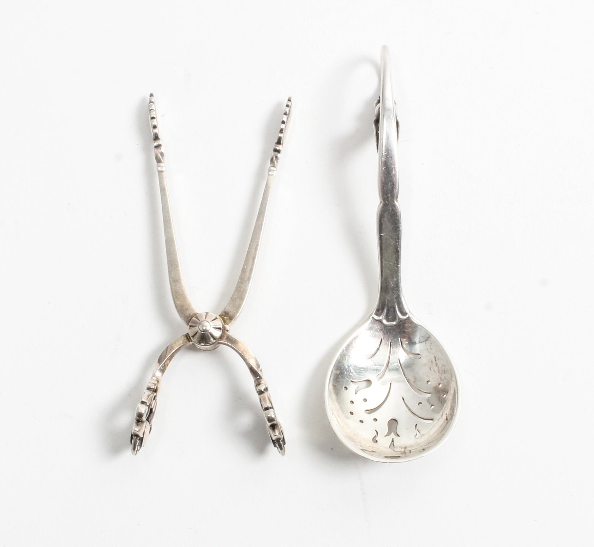 Two Danish Silver Serving Articles, Georg Jensen Silversmithy, Copenhagen, comprising Acorn pattern sugar nips dated circa 1920 and a B