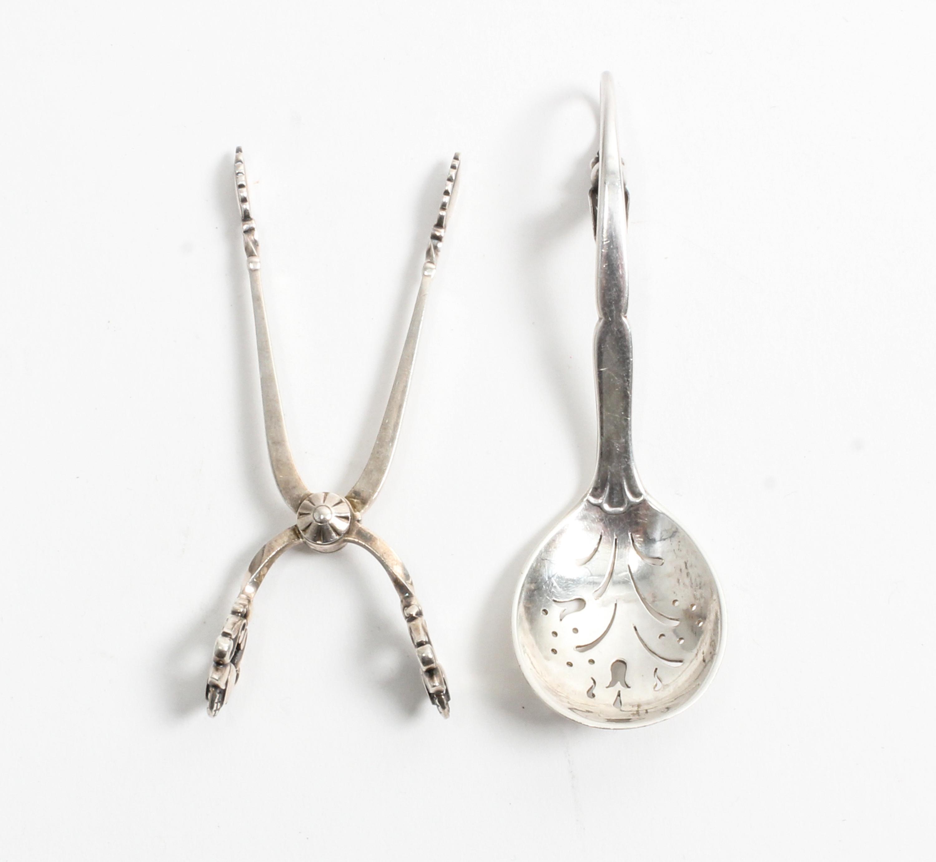 Two Danish Silver Serving Articles, Georg Jensen Silversmithy, Copenhagen, comprising Acorn pattern sugar nips dated circa 1920 and a B