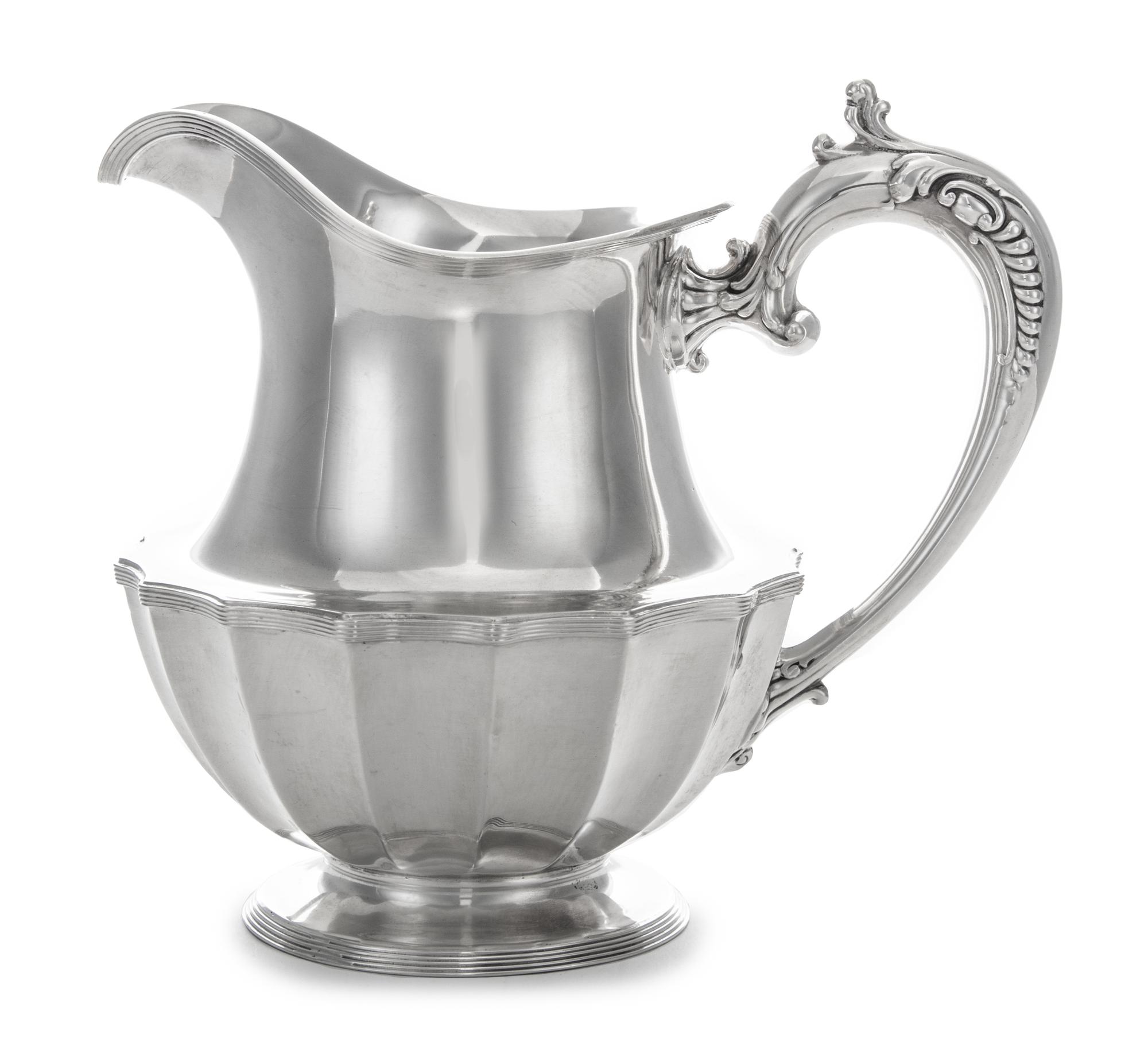 An American Silver Small Pitcher, Frank W. Smith Silver Co., Gardner, MA, of baluster form with a paneled lower body.