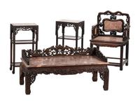 A Chinese Carved Hardwood Four-Piece Furniture Suite