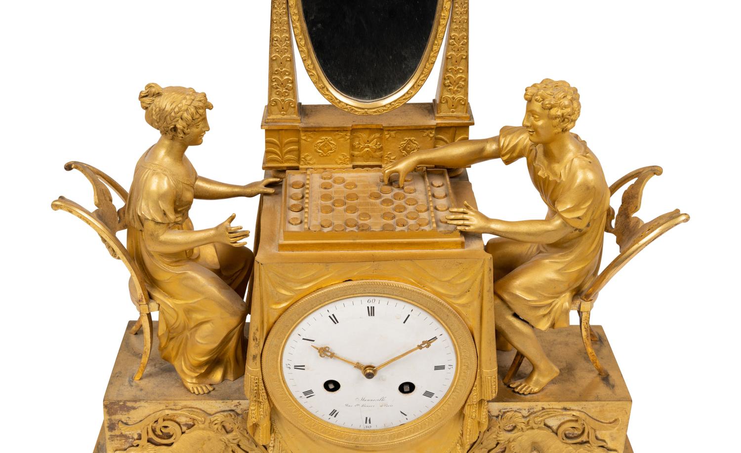 An Empire Gilt Bronze Figural Mantel Clock