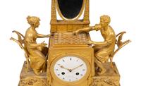 An Empire Gilt Bronze Figural Mantel Clock