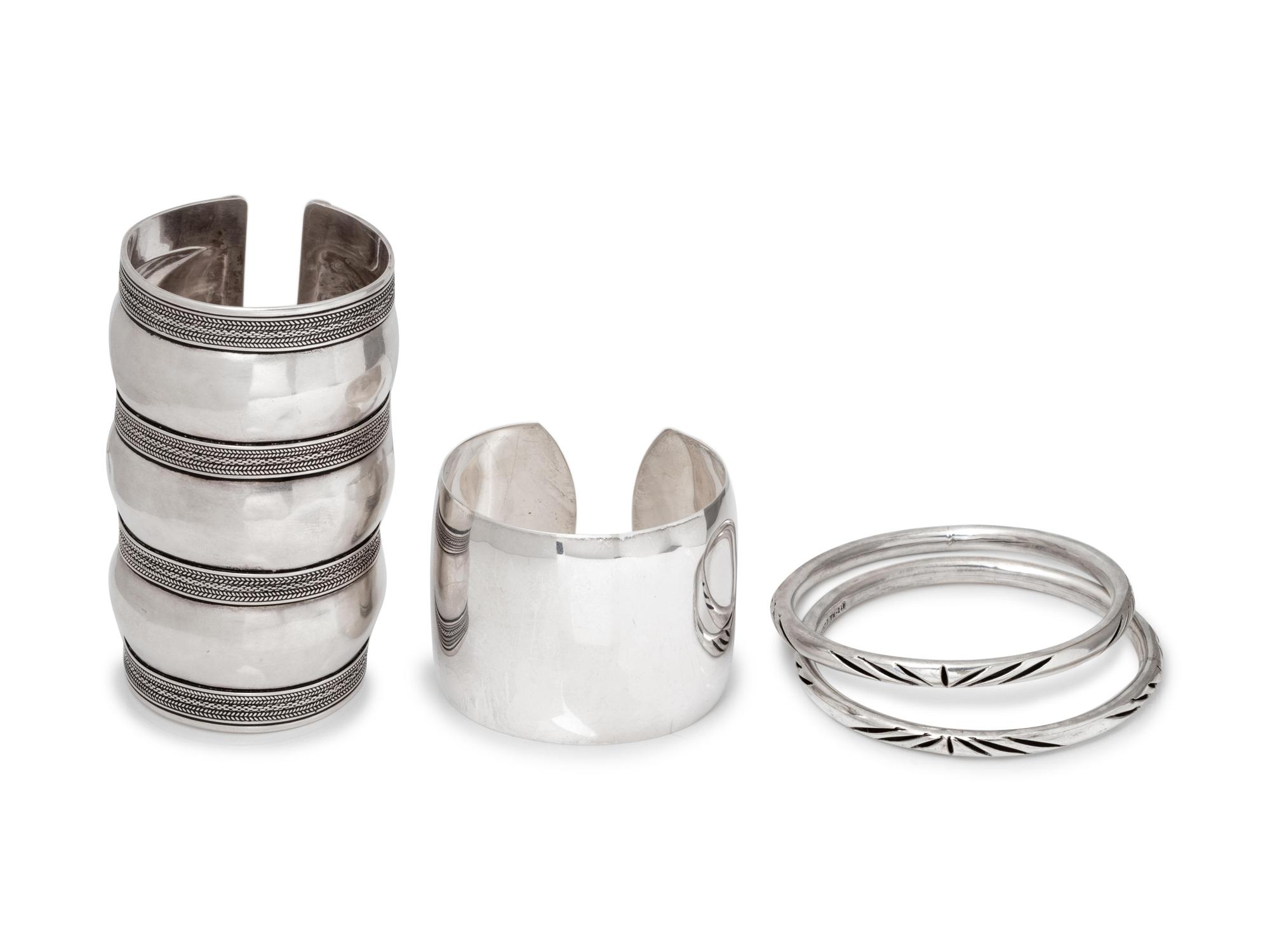 A Collection of Silver Bracelets,