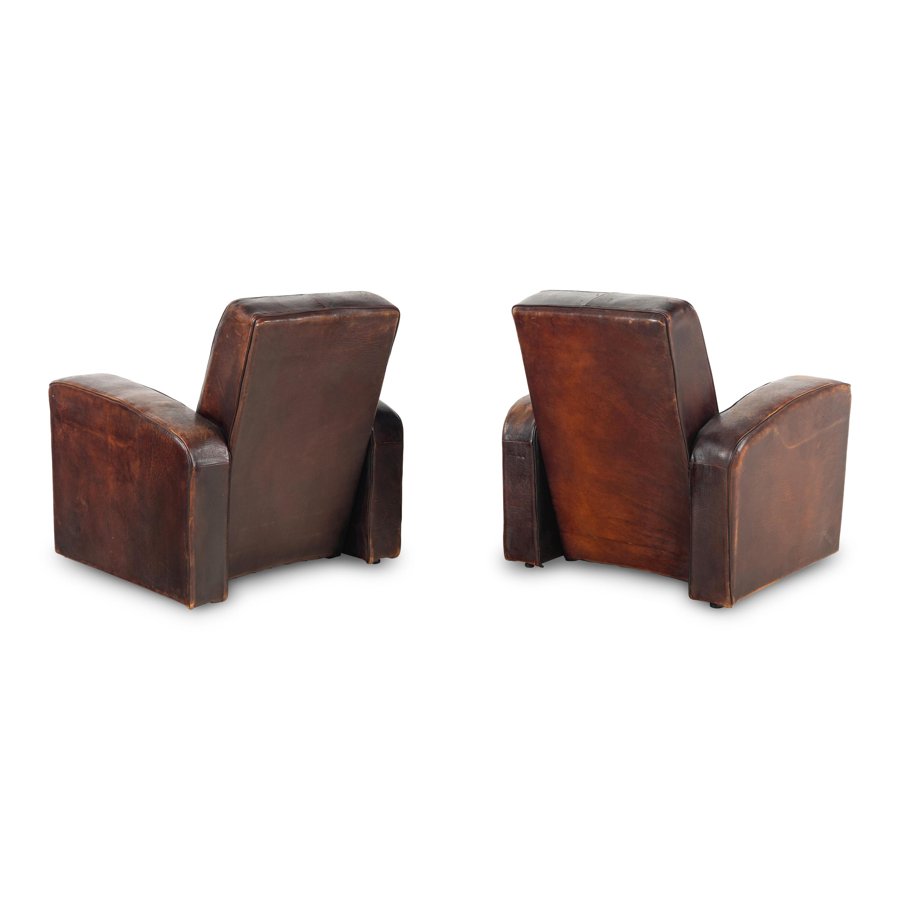 A Pair of Leather Club Chairs