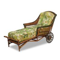 A polychrome painted rattan and upholstered chaise longue american, circa 1900
