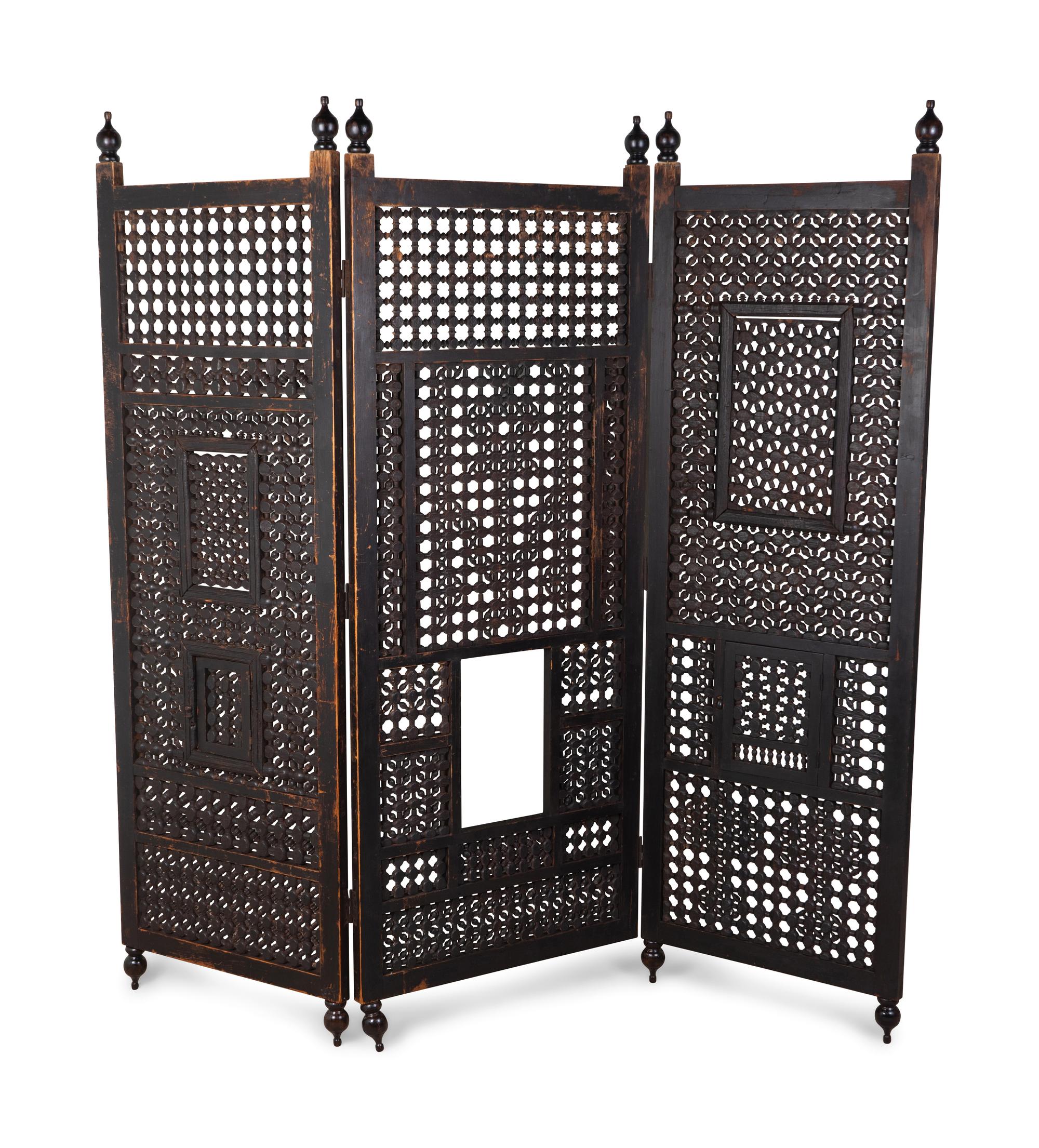 An Indian Pierced Carved Teak Three-Panel Floor Screen — 20TH CENTURY