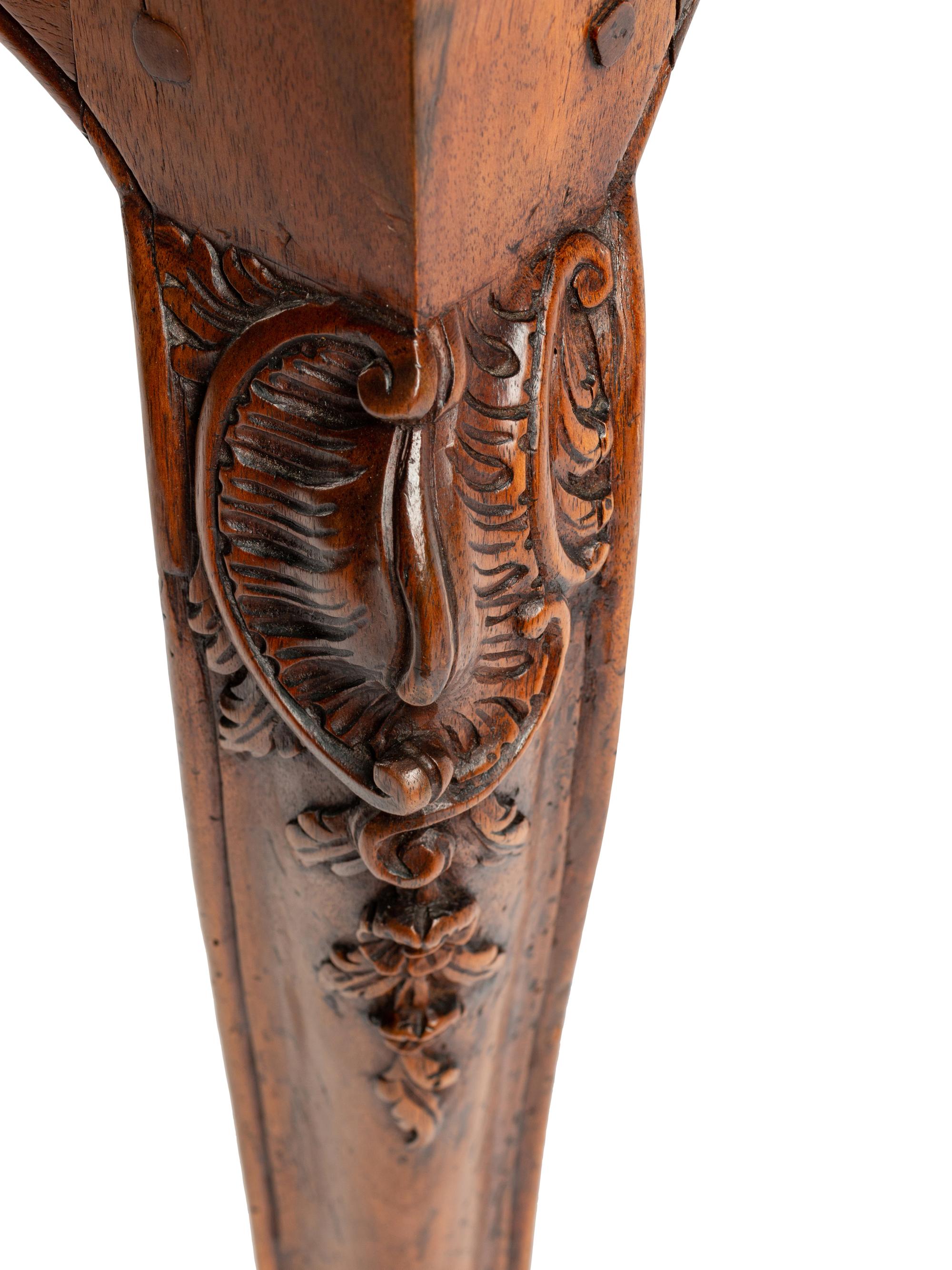 A Louis XV Walnut Four-Drawer Table