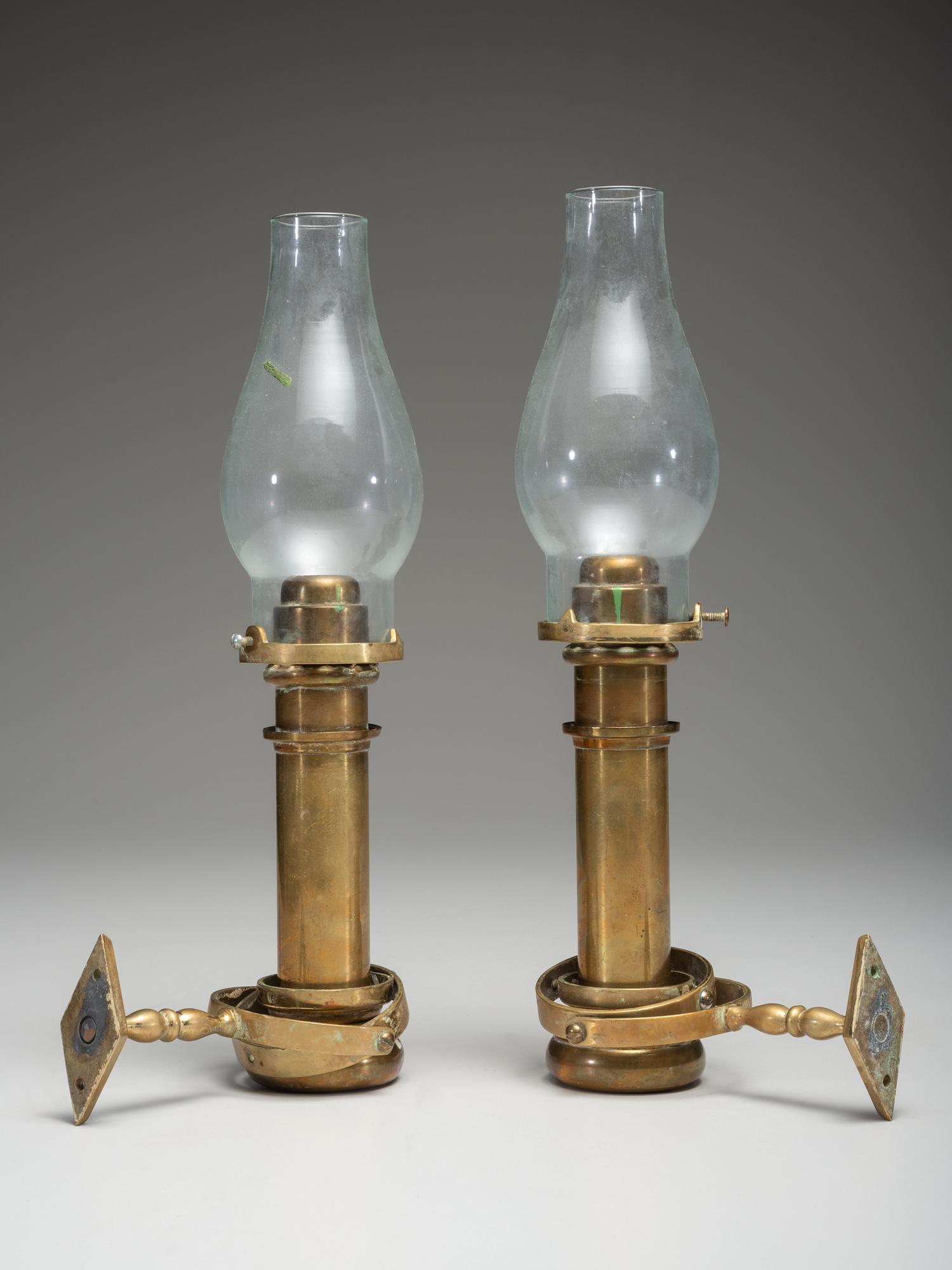 A Pair of Brass Gimballed Ship's Wall Oil Lamps with Hurricane Shades