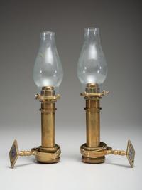 A Pair of Brass Gimballed Ship's Wall Oil Lamps with Hurricane Shades