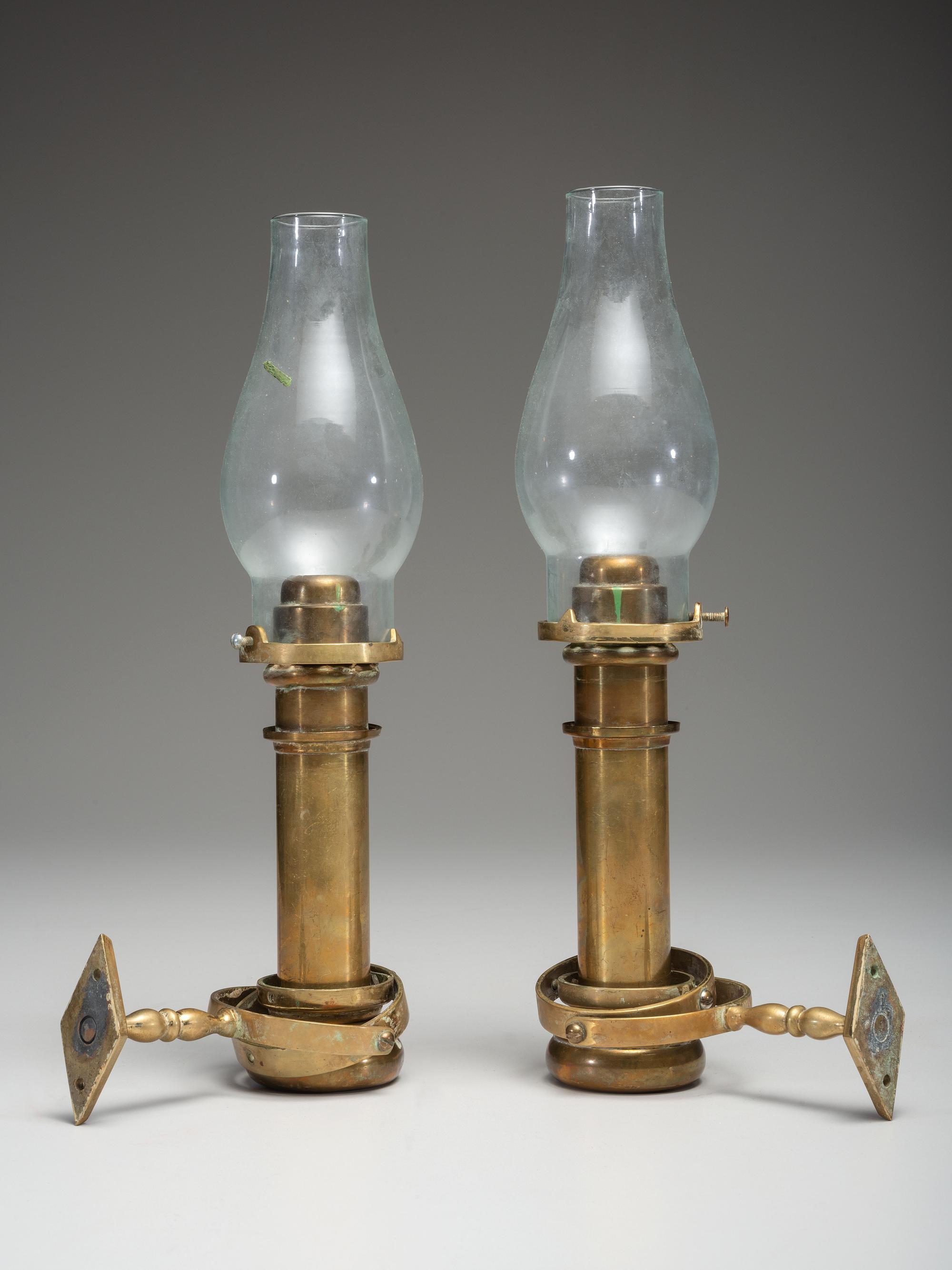 A Pair of Brass Gimballed Ship's Wall Oil Lamps with Hurricane Shades