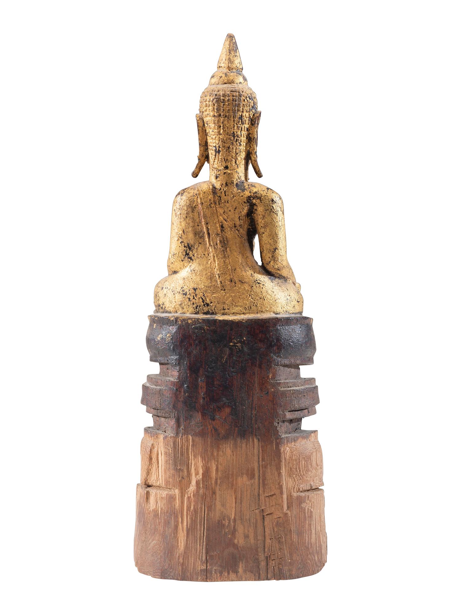 A Carved Giltwood Seated Buddha Figure