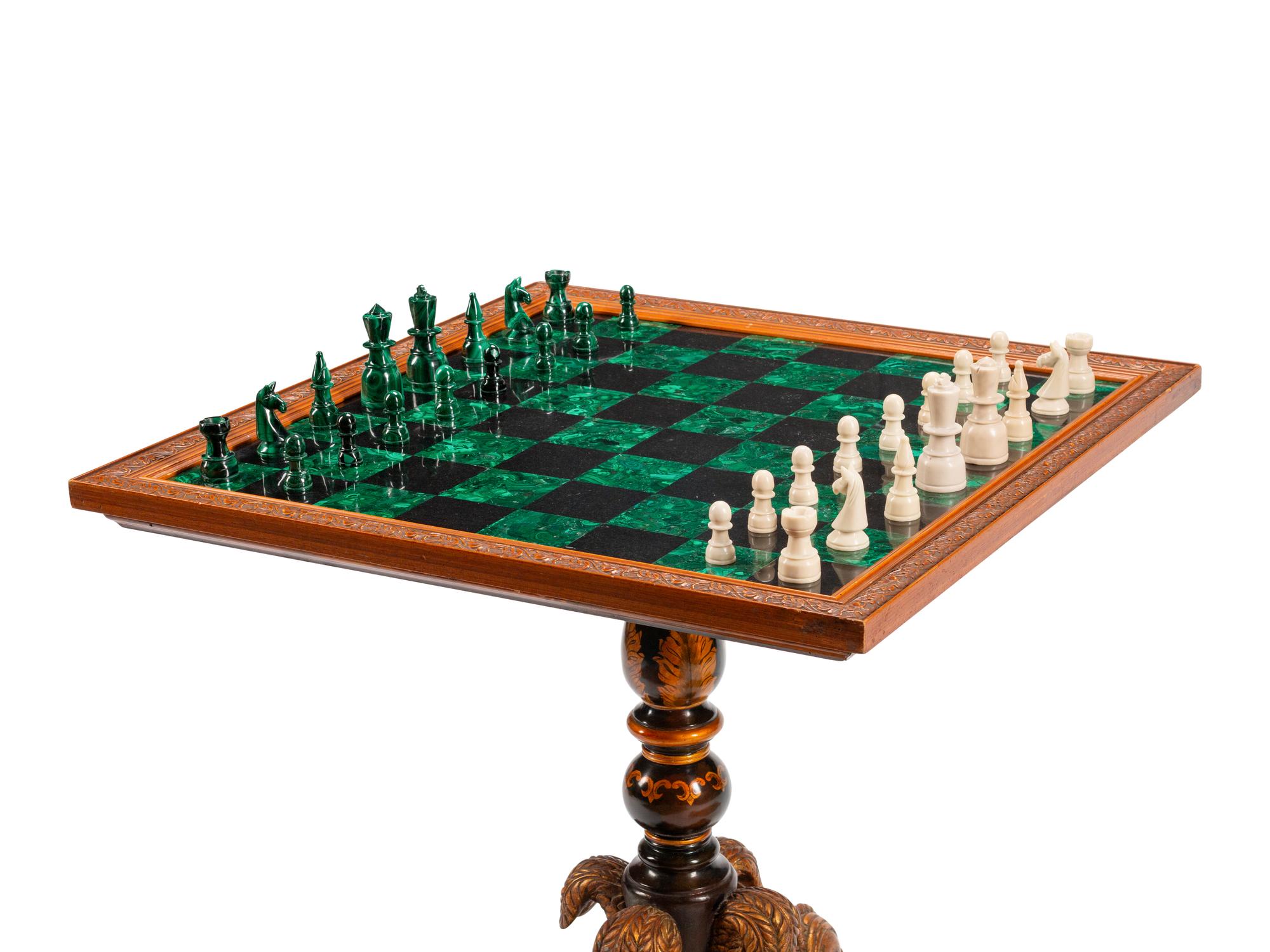 An Italian Parcel-Gilt and Lacquer Games Table
