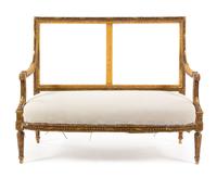 A Louis XVI Style Giltwood Canape Height 38 1/2 x width 50 1/2 x depth 24 1/2 inches. — 19TH CENTURY