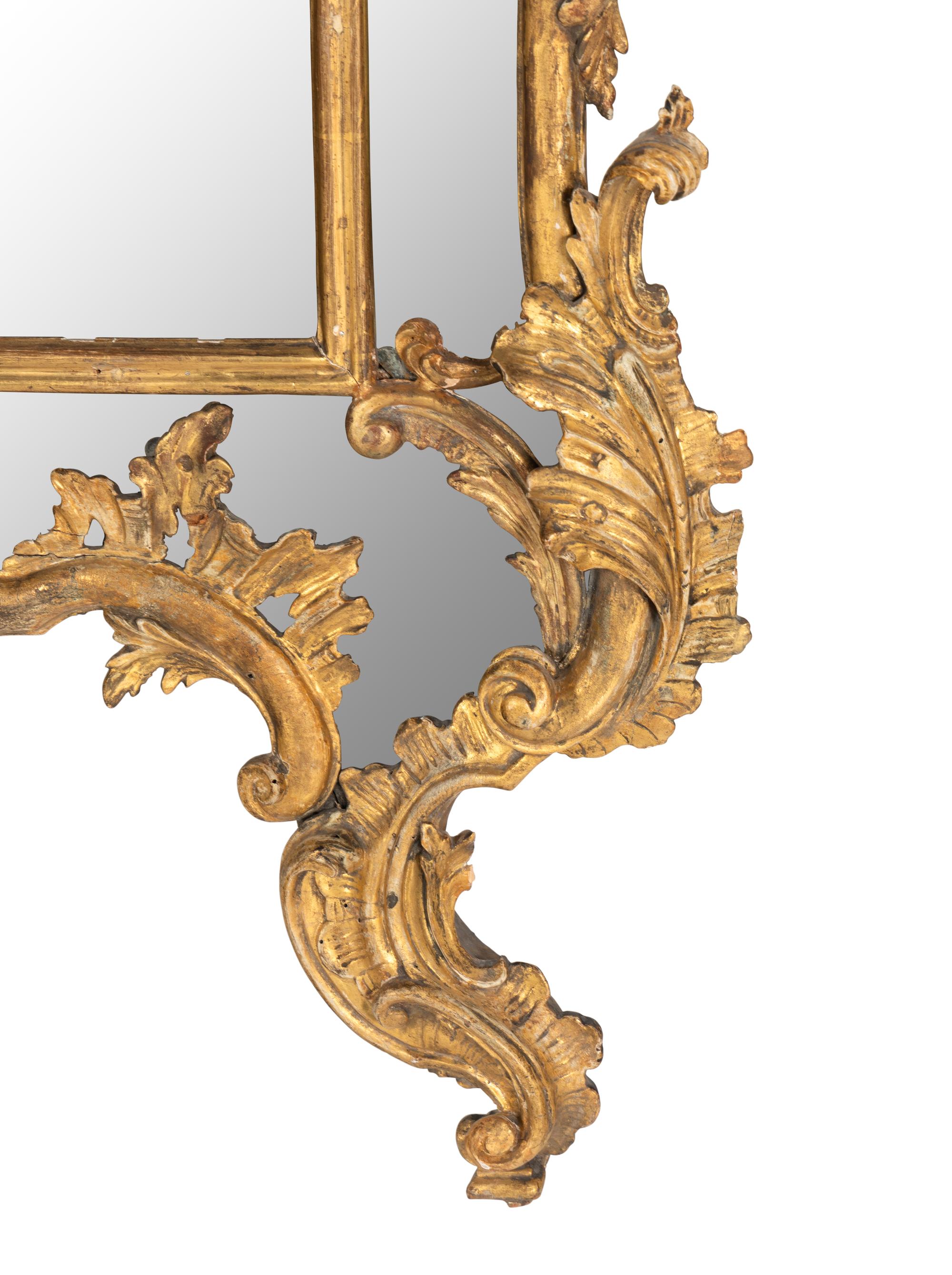 An Italian Rococo Giltwood Mirror