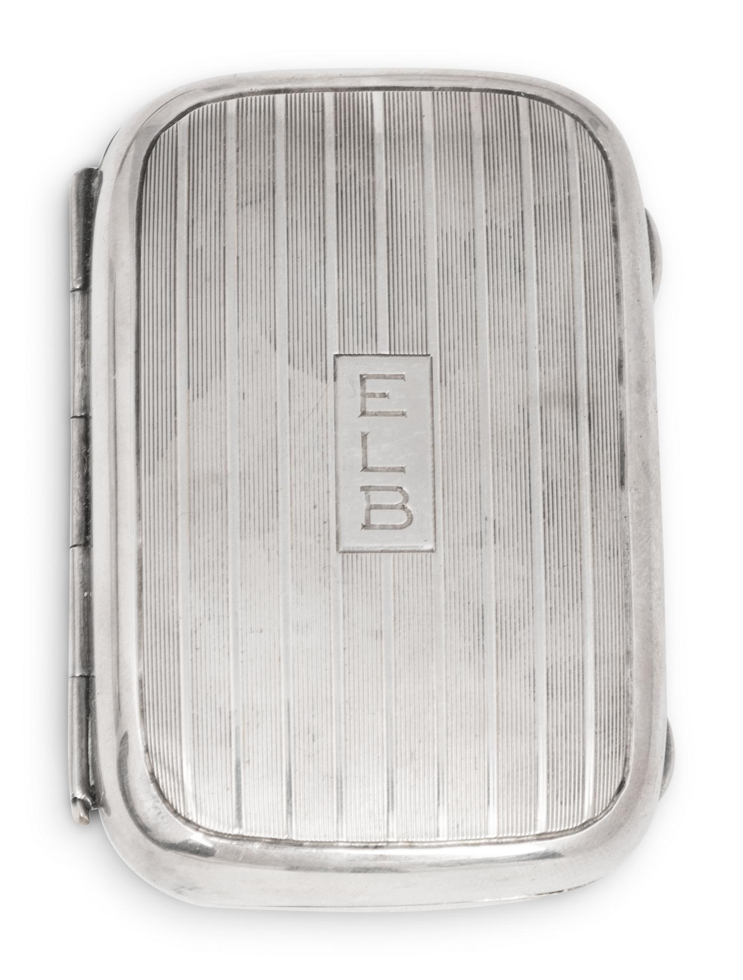 A Cased Gorham Silver Eighteen-Piece Travel Dresser Set Retailed by Cartier