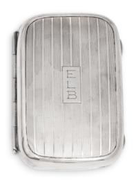 A Cased Gorham Silver Eighteen-Piece Travel Dresser Set Retailed by Cartier