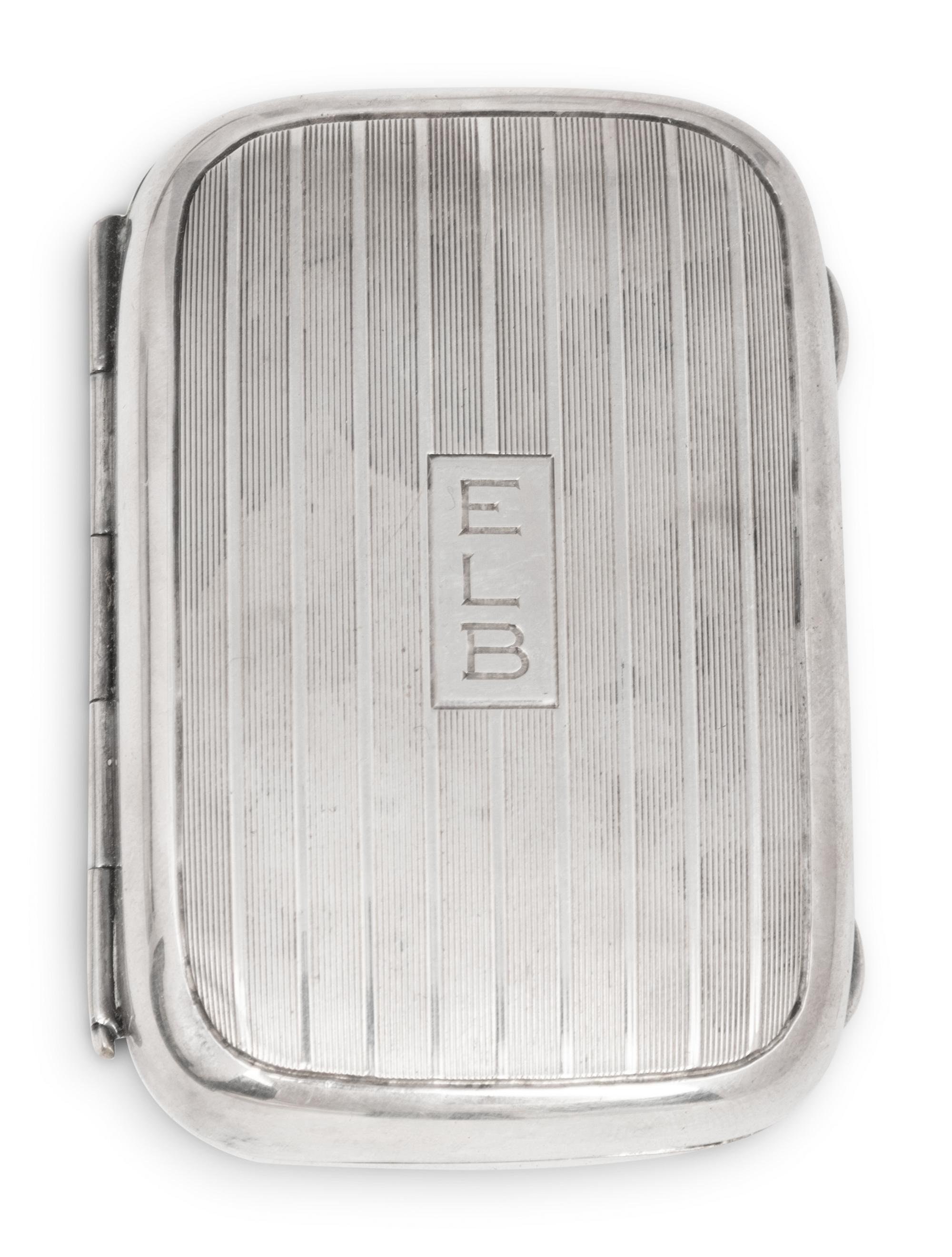A Cased Gorham Silver Eighteen-Piece Travel Dresser Set Retailed by Cartier